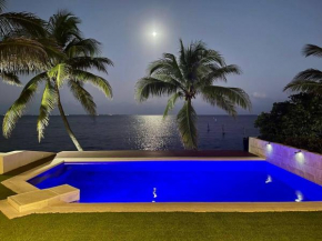 5BR Ocean Front Hotel Zone Luxury House by Solmar Rentals